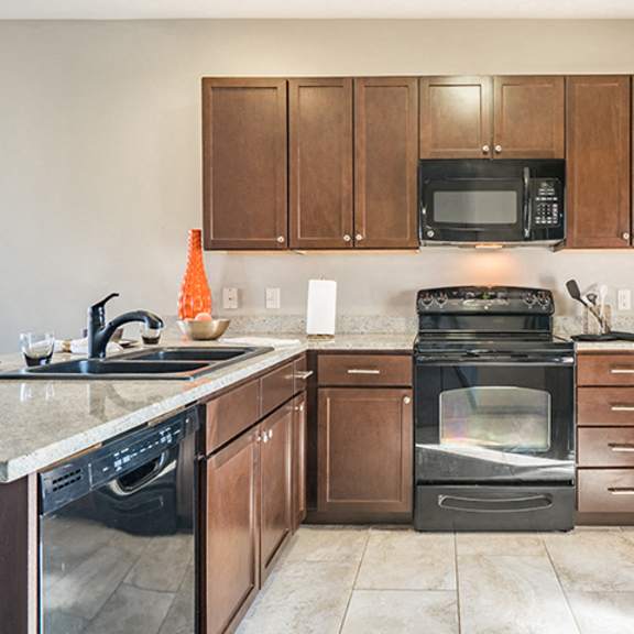 Thumbnail 3 of 11 Large Kitchen with open kitchen and seated island at The Villas at Wilderness Ridge in Lincoln Nebraska