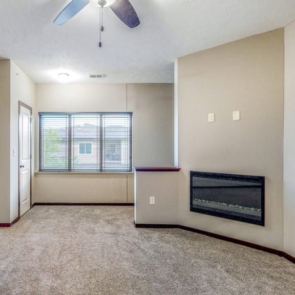 Thumbnail 6 of 19 Relax by the modern, electric fireplace in the living area of the Ash