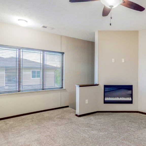 Thumbnail 7 of 19 You'll love the modern electric fireplace and spacious living area at The Villas at Wilderness Ridge in southwest Lincoln NE 68512