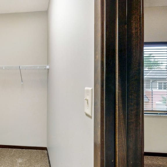 Thumbnail 17 of 19 Walk in closet in the bedroom at The Villas at Wilderness Ridge luxury apartments in southwest Lincoln NE 68512