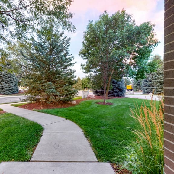 Thumbnail 18 of 19 You'll love manicured landscape view from your private entrance of this two bedroom Cedar floor plan.