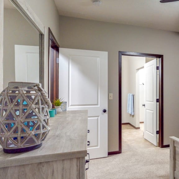 Thumbnail 10 of 19 The master bedroom features an attached bathroom and spacious closet in the Cedar floor plan