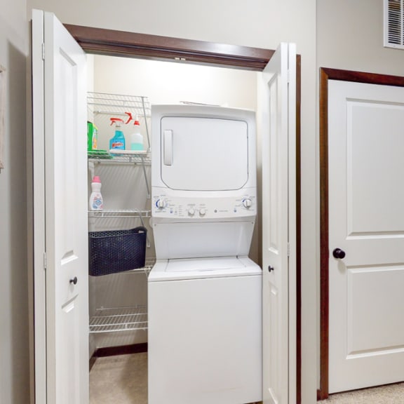 Thumbnail 17 of 19 The Cedar features a full-size stacked washer and dryer.