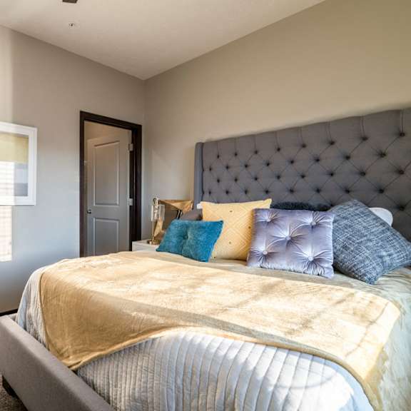Thumbnail 14 of 16 Spacious bedroom large enough to include a king sized bed at The Villas at Mahoney Park