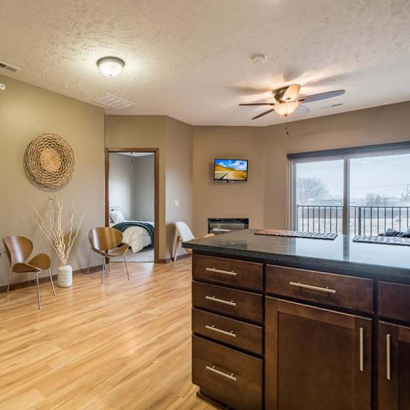 Thumbnail 5 of 15 Open concept apartment kitchen and living room