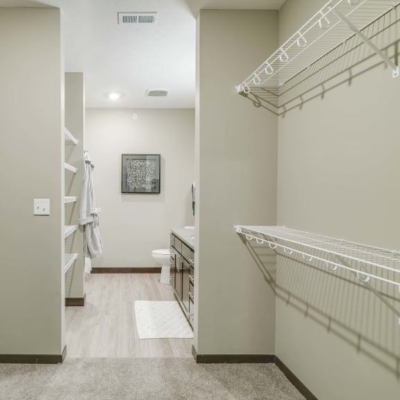 Thumbnail 11 of 17 Walk in closet in master bedroom at WH Flats new luxury apartments in south Lincoln NE 68516