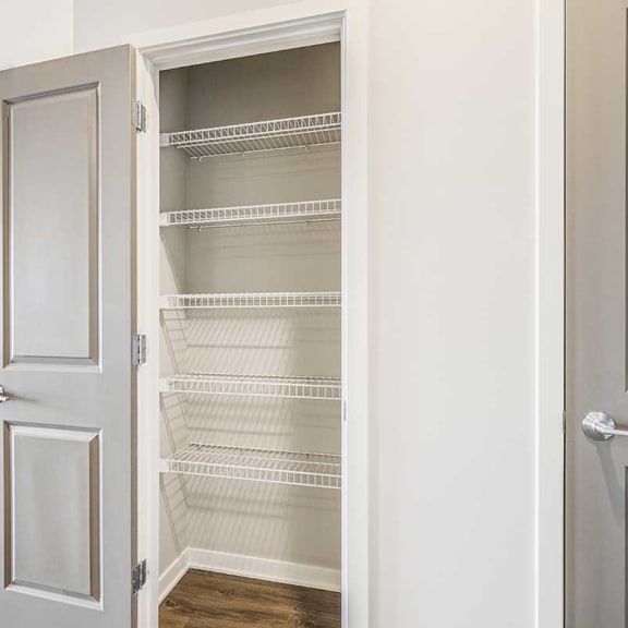 Thumbnail 13 of 27 a storage pantry with built-in wire shelves