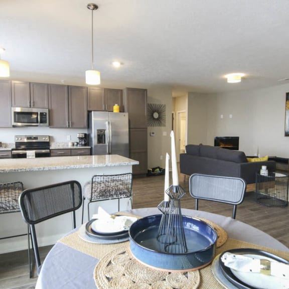Thumbnail 4 of 8 View of kitchen and living room from dining area at WH Flats new luxury apartments in south Lincoln NE 68516
