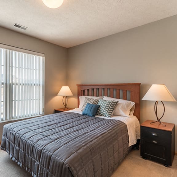 Thumbnail 6 of 10 large bedroom with big window for lighting at Williamsburg Park Apartments in Lincoln NE