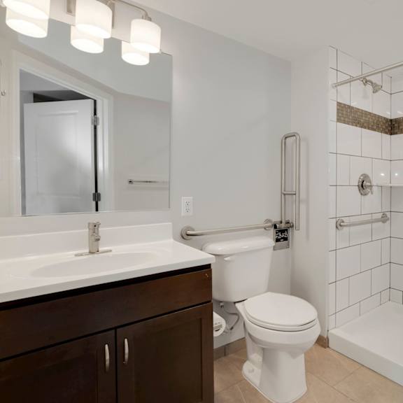 a bathroom with a toilet sink and bathtub