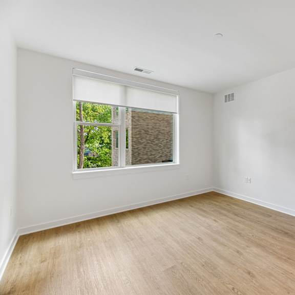 a room with a window and a door.