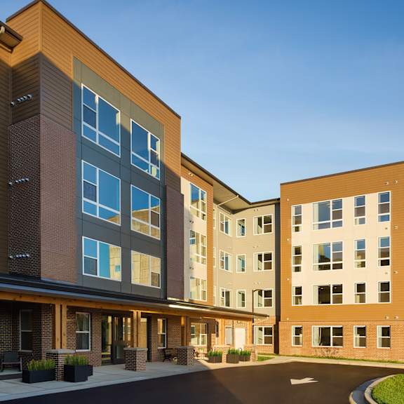 a large building with a street in front of it