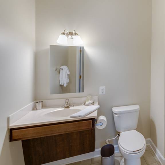bathroom with shower tile detailing