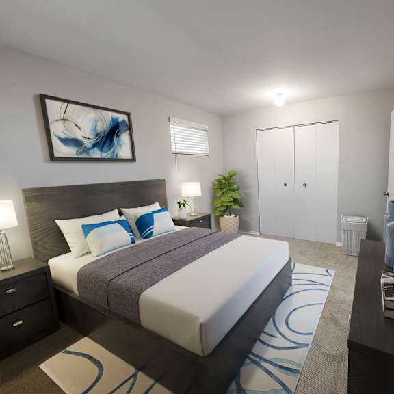 a bedroom with a bed and a tv