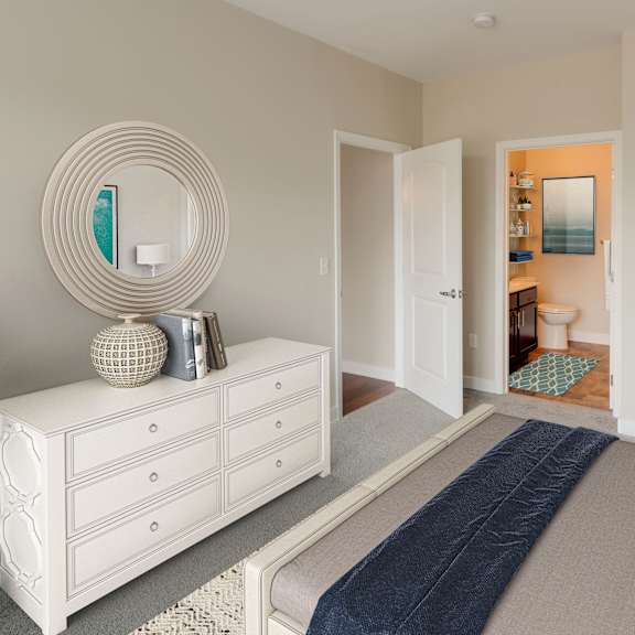 staged bedroom with bathroom and closet