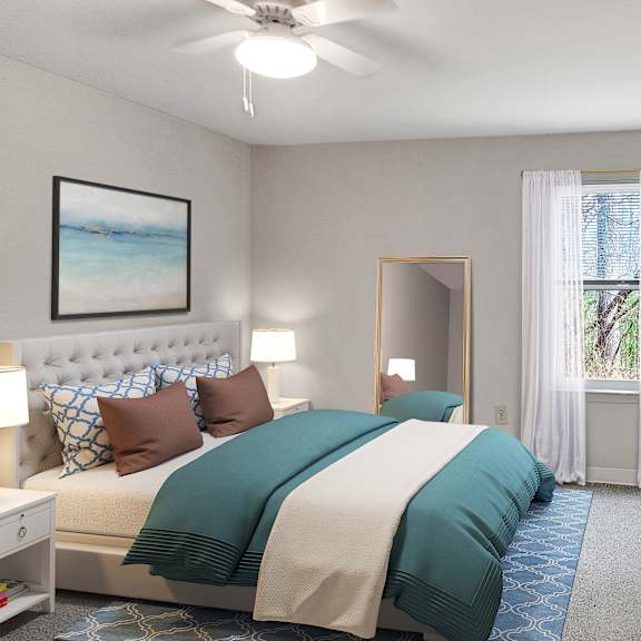 a bedroom with a bed and a ceiling fan