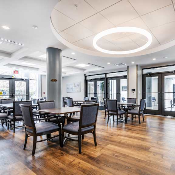 a large room with tables and chairs