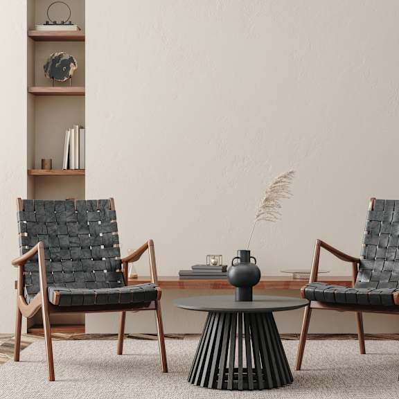 two chairs in living room around small coffee table