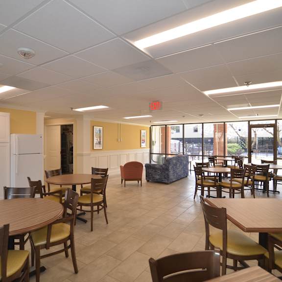 a common area with tables and chairs