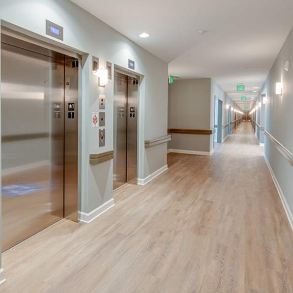 hallway with elevators