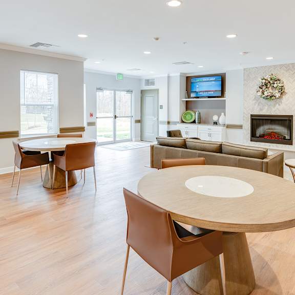 community room with holiday tree