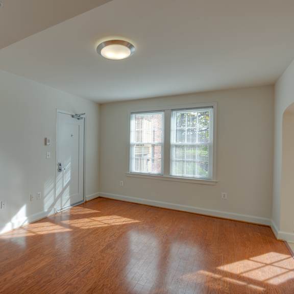 spacious living room with hardwood floors