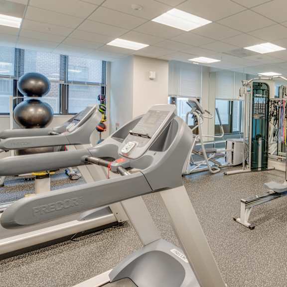 fitness center with cardio equipment