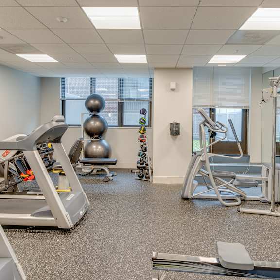 fitness center with cardio equipment