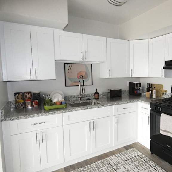 this is a photo of the kitchen in a 1 bedroom apartment at deer hill apartments in c