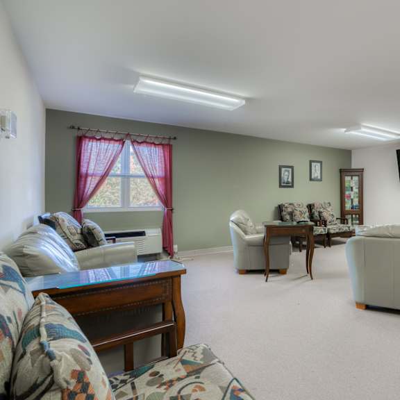 a living room with a couch and a tv