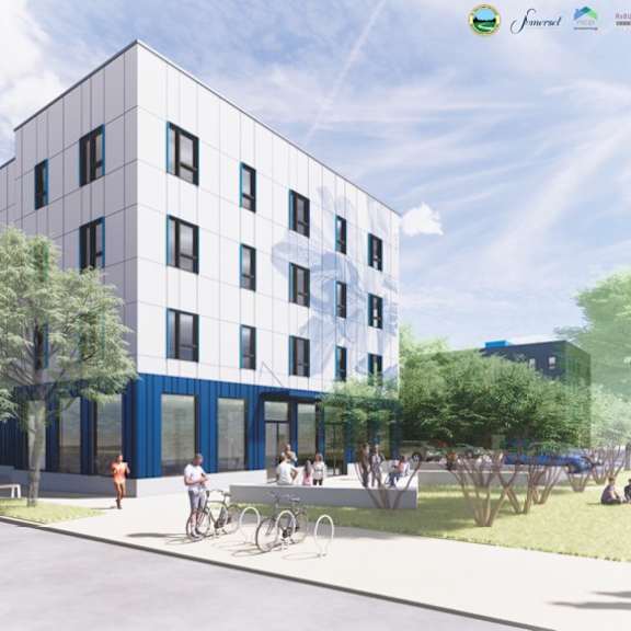 a modern building with a blue door and windows is surrounded by trees and people walking.