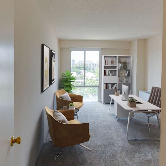 staged bedroom that has flexible office space