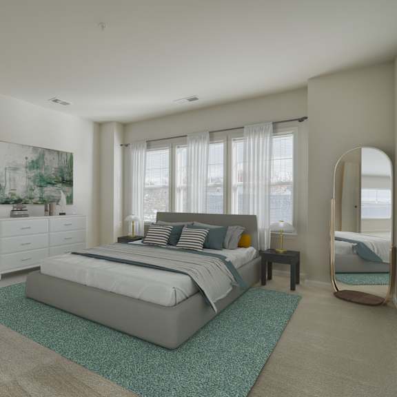 a bedroom with a bed and a dresser and a mirror
