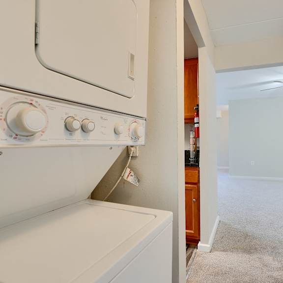 a white oven and stove top in a kitchen.