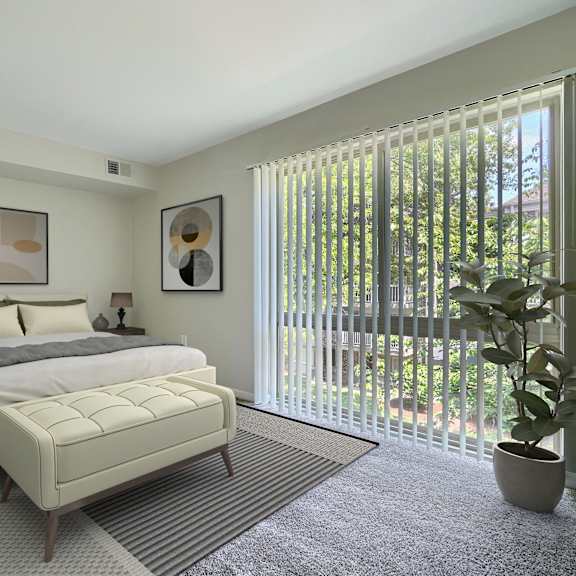 a bedroom with a large bed and a potted plant.