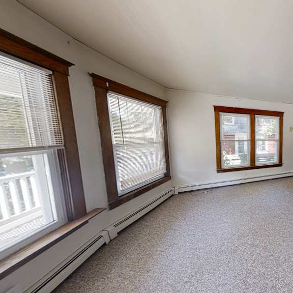 a room with a window and a door.