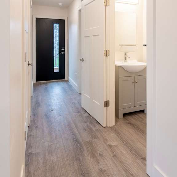 a bathroom with a sink and a mirror.