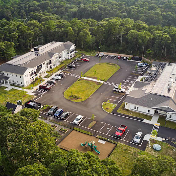 arial view of a building and parking lot