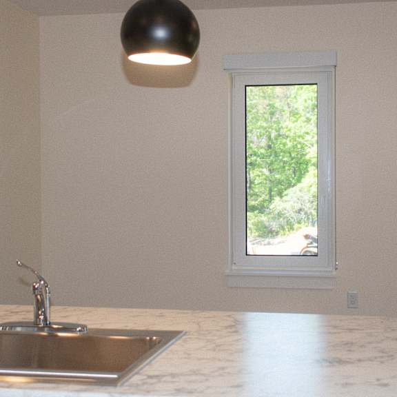 an empty kitchen with a sink and a window