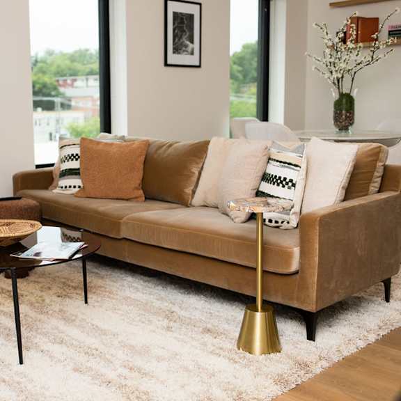 a living room with a couch and a coffee table