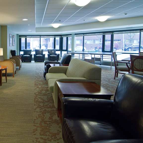 a living room filled with furniture and a television