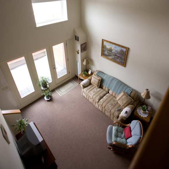 an overhead view of a living room with a couch