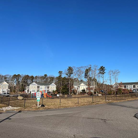 a street with houses on the side of a road