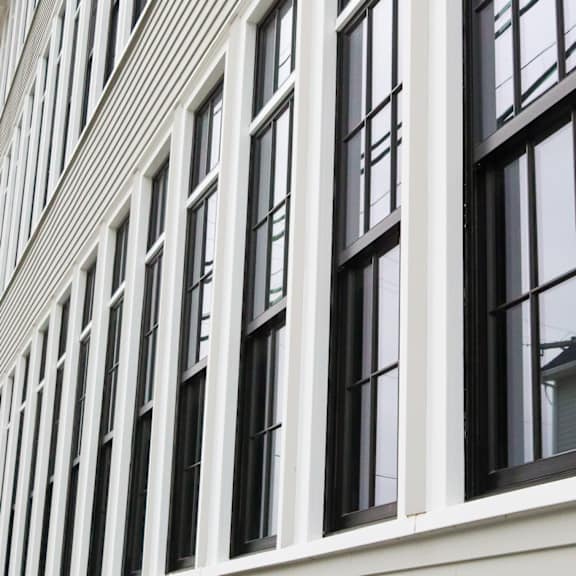 a building with many windows on the side.