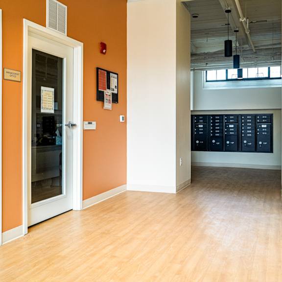a room with a white chair and a white door.