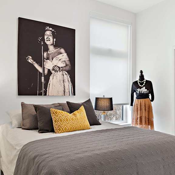 bedroom with cozy bed at the freelon at sugar hill, detroit, mi, 48201