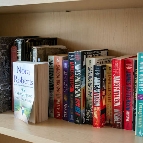 a selection of books on a bookshelf