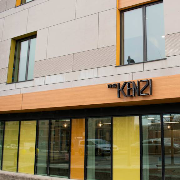 a building with a sign that says "k12" on the front.