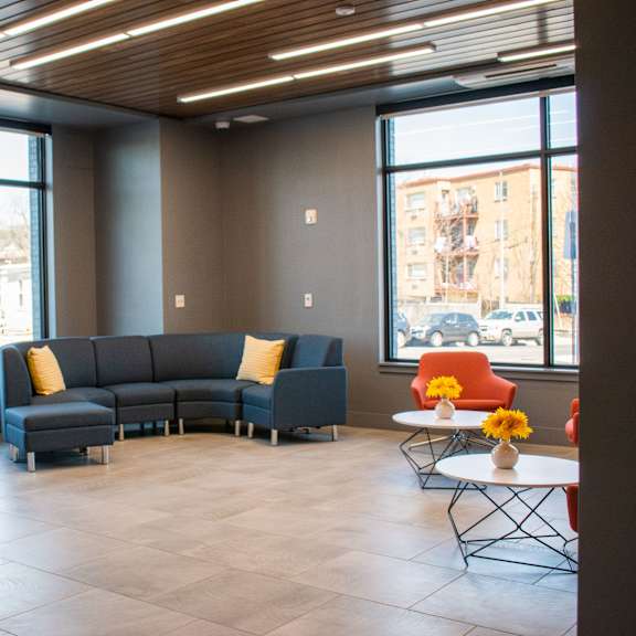 community lounge at the loop at mattapan station, boston, 02126