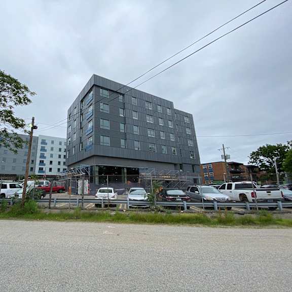 exterior view of property at the loop at mattapan station, boston, ma